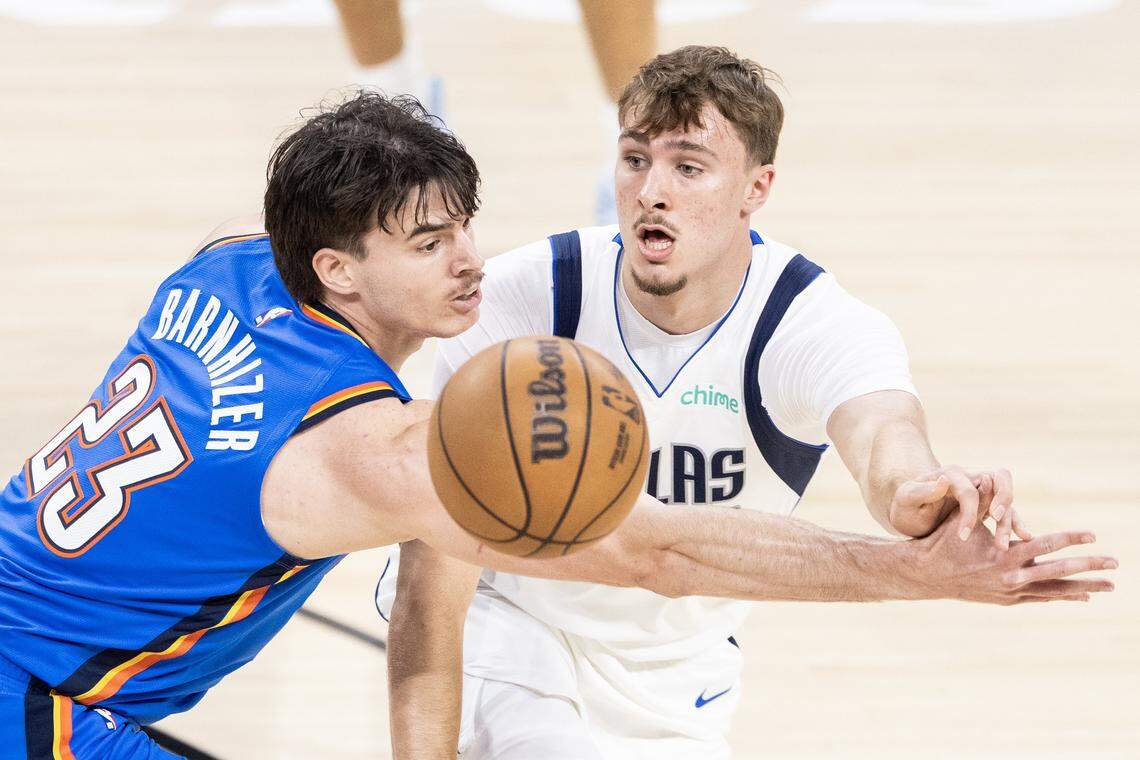 Mavericks forward Cooper Flagg (32) passes the ball in the first half of a preseason NBA game between the Dallas Mavericks and Oklahoma City Thunder at Dickies Arena in Fort Worth on Monday, Oct. 6, 2025.