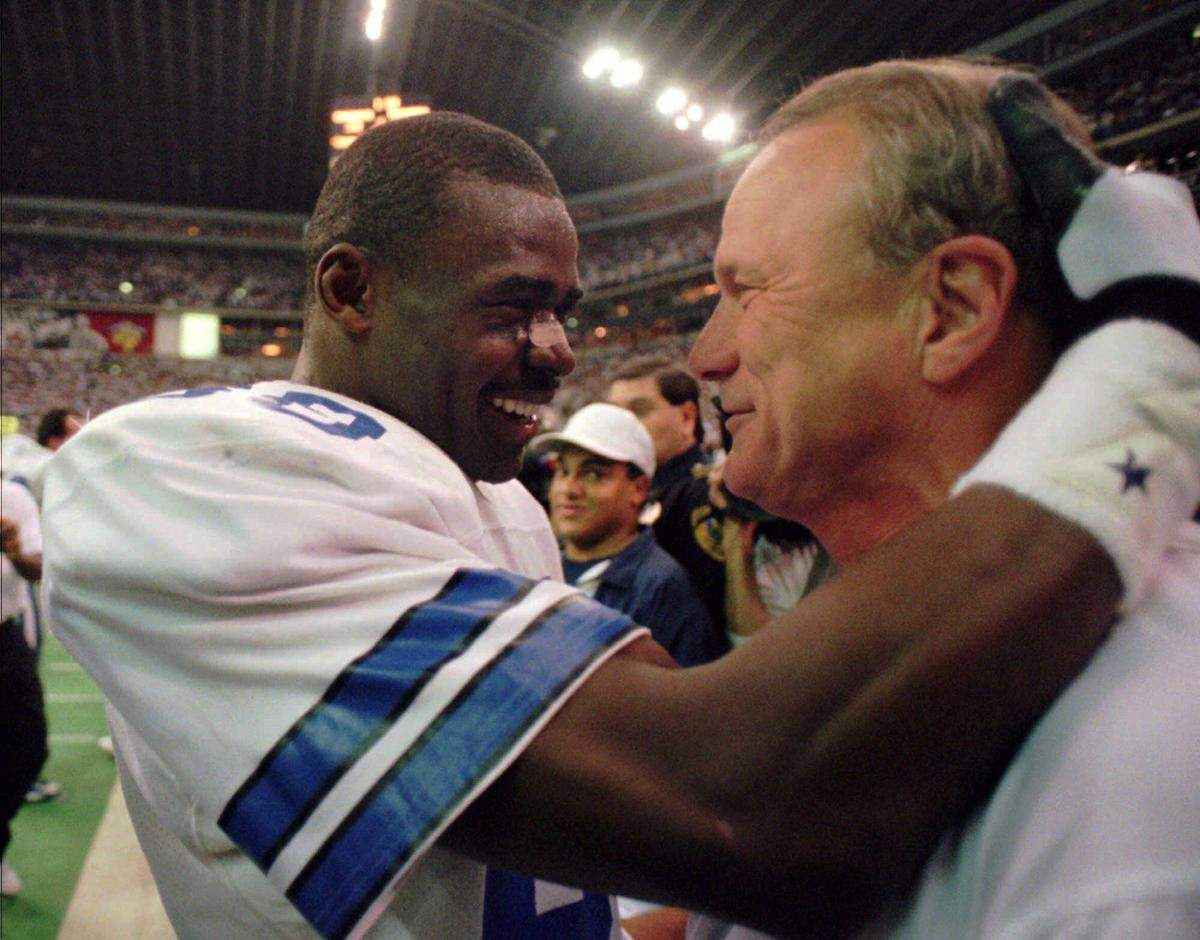 The last time the Dallas Cowboys won at least two playoff games in a season was in January 1996, the year they won their last Super Bowl. Michael Irvin, left, and head coach Barry Switzer led the Cowboys over the Green Bay Packers 38-27 in the NFC Championship at Texas Stadium on Jan. 14, 1996. Dallas has won three playoff games combined in the 21 years since.