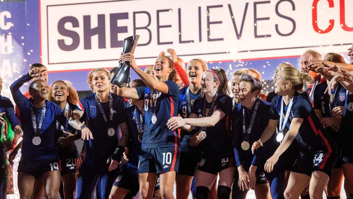 United States captain Carli Lloyd hoists the SheBelieves Cup trophy after a SheBelieves Cup women’s soccer match against Japan, Wednesday, March 11, 2020 at Toyota Stadium in Frisco, Texas. (AP Photo/Jeffrey McWhorter)