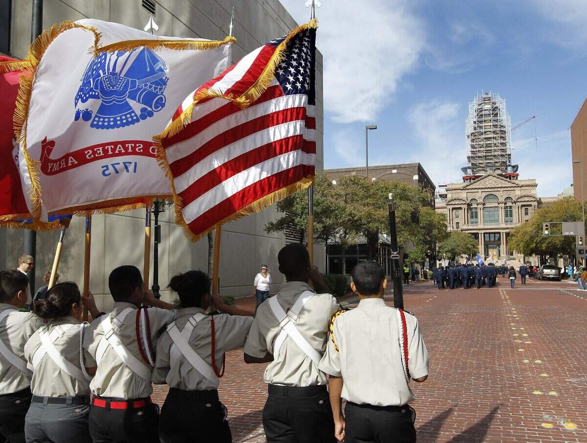Nov. 12, 2011: The William James Middle School color guard marches toward the Tarrant County Courthouse in the Veterans Day parade.