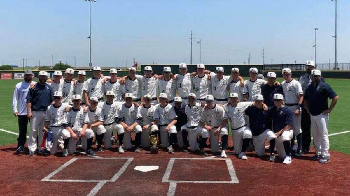 Eaton poses for a photo after winning a playoff series vs. Grapevine. The Eagles won Game 1 of the 5A Region I final on Thursday and are one game away from clinch a state tournament berth.