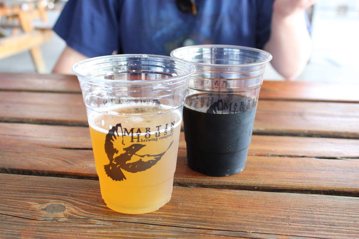 Pro tip: On Thursdays and Saturdays, Martin House has the wristband deal where patrons on a budget can try four 8-ounce pours for $15. Pictured pours are Super Fast Jellyfish, a sour beer, left, and Fat Elvis, a banana stout, right.