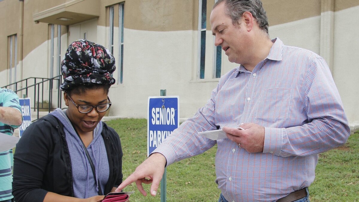 Texas House District 92 candidate Steve Riddell  talks to Jessica Cox during election day at Concordia Lutheran Church in Euless, Texas, Tuesday Nov. 06, 2018. (Special to the Star-Telegram Bob Booth)

