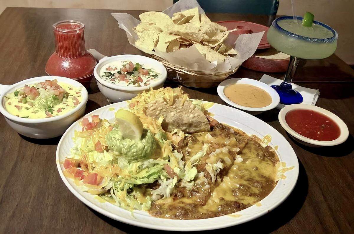 90-plus years of history at The Original Mexican Eats Cafe: a “Roosevelt Special” with chalupa, enchilada, taco and dips.
