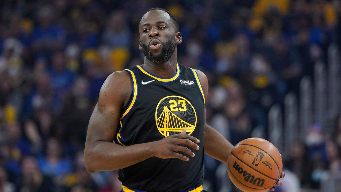 Golden State Warriors forward Draymond Green brings the ball up against the Memphis Grizzlies during the first half of Game 3 of an NBA basketball Western Conference playoff semifinal in San Francisco, Saturday, May 7, 2022. (AP Photo/Jeff Chiu)