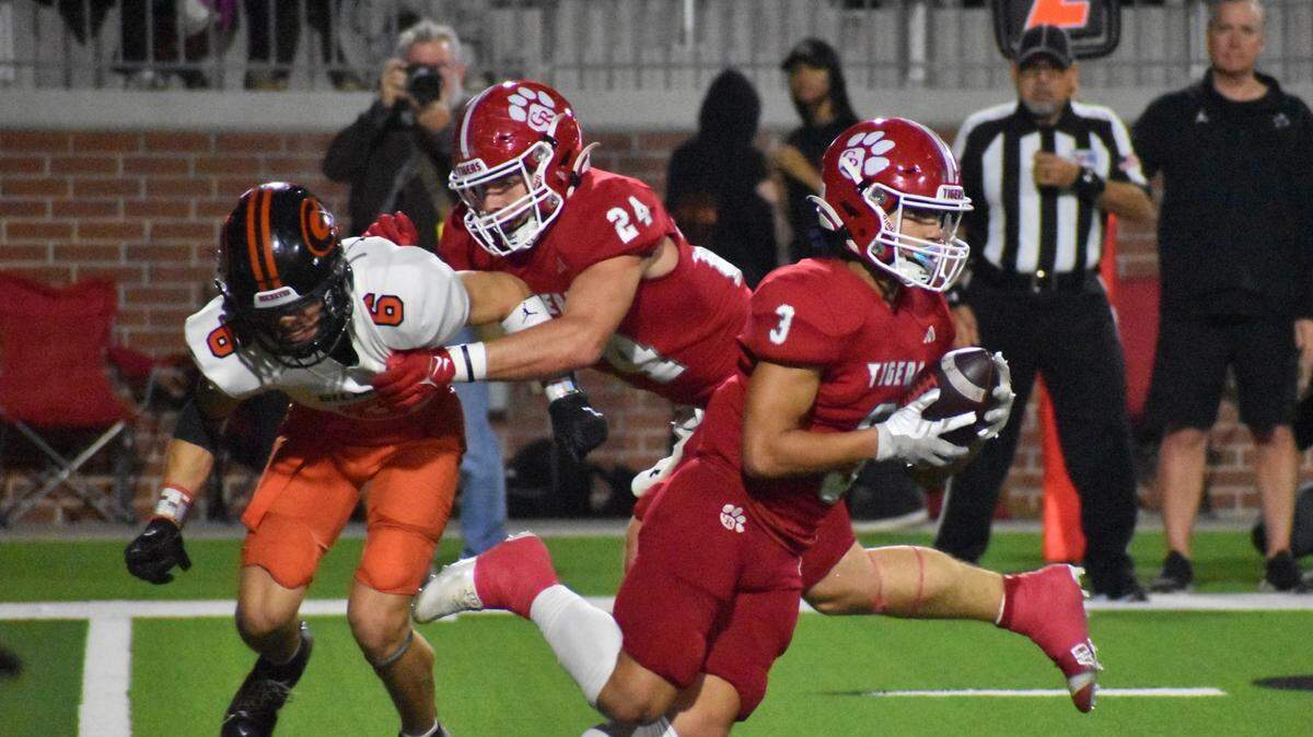 Glen Rose’s Josiah Groeneweg runs after a catch, while getting blocking help from Camden Raymond on Gilmer’s Connor Dodd during the first quarter of Friday’s playoff game in Prosper on Dec. 8, 2023.