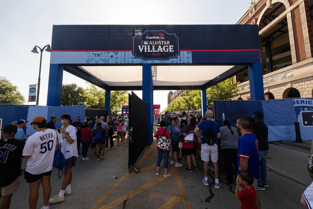 Fans begin to line up to enter the first day of the 2024 MLB All-Star Village at Choctaw Stadium in Arlington on Saturday, July 13, 2024.