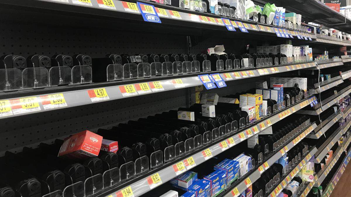 Shelves for products such as Advil and other pain relievers were nearly empty at Wal-Mart in Southwest Fort Worth.