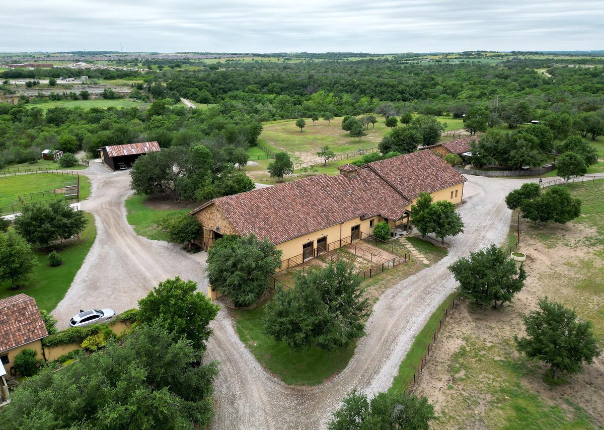 The stable barn on the property of Lazy H Ranch, a 50-acre property in Fort Worth.