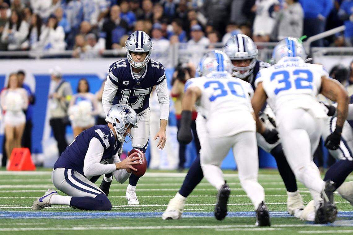 DETROIT, MICHIGAN - DECEMBER 04: Brandon Aubrey #17 of the Dallas Cowboys kicks a field goal against the Detroit Lions during the third quarter at Ford Field on December 04, 2025 in Detroit, Michigan. (Photo by Mike Mulholland/Getty Images)