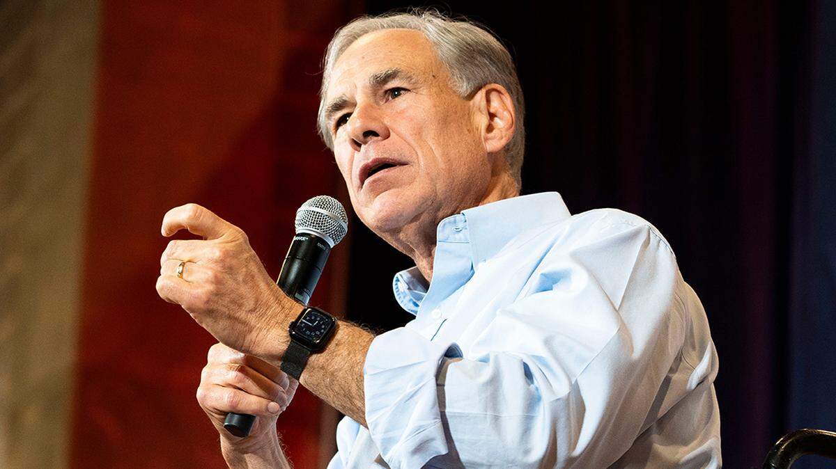 Texas Gov. Greg Abbott speaks during Iowa Gov. Kim Reynolds’ Harvest Festival fundraiser at Oman Family Youth Inn at the Iowa State Fairgrounds on Saturday, Oct. 5, 2024, in Des Moines.