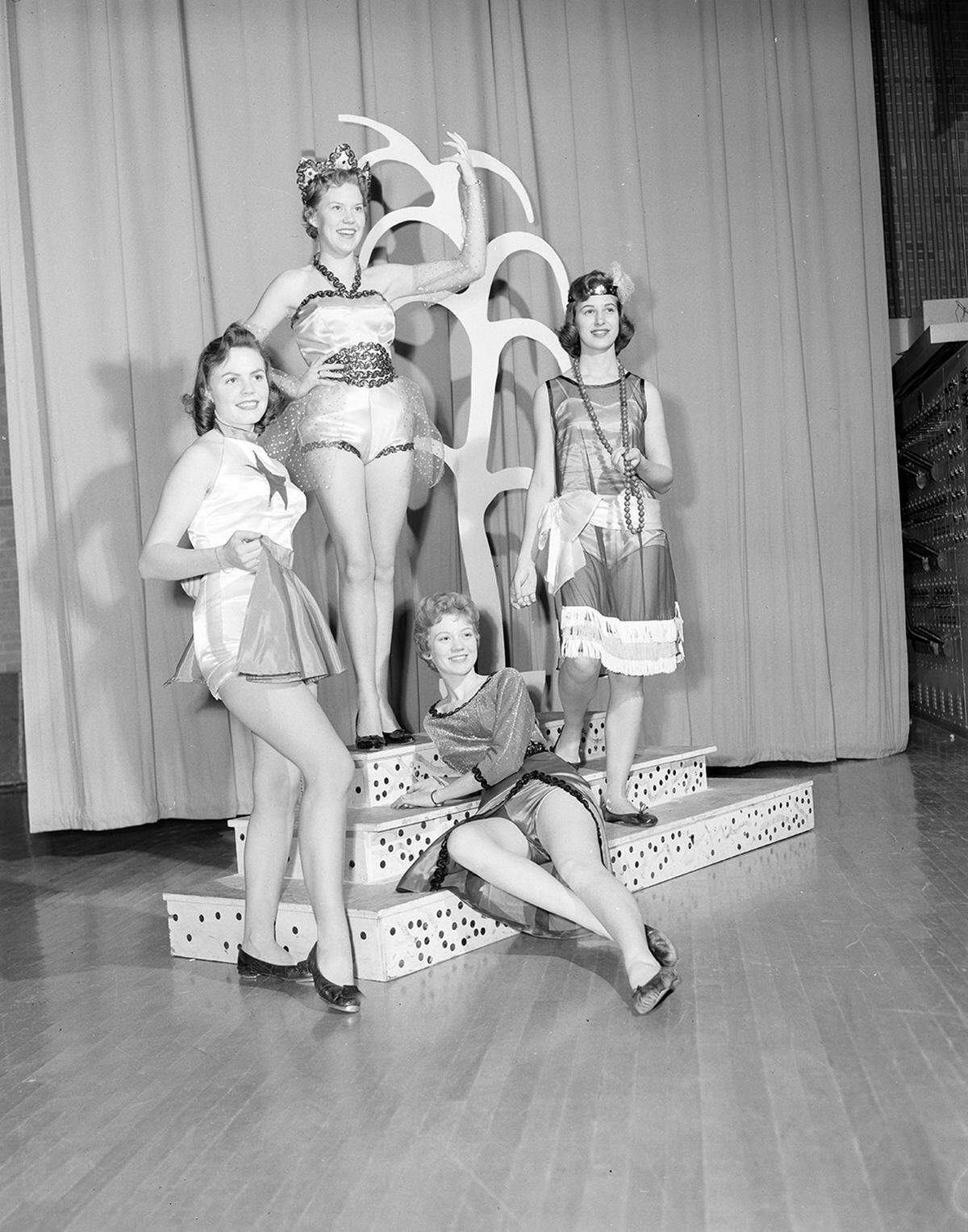 Nov. 21, 1958: “An invitation to Paschal High School’s Sports Follies comes from Wilma Newman (top of steps), Donna Kay Bowers, left, Everta Hartman, right, and Sharon Manson. The annual show will be given at 8 pm Monday and Tuesday in the Paschal auditorium.”