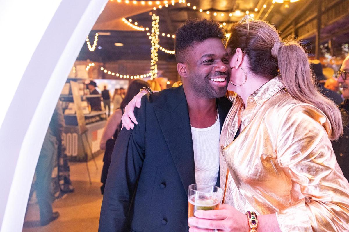 Musician Abraham Alexander embraces Kelsey Patterson, the wife of Gary Patterson, at ‘The Big Good’s annual fundraiser ‘The Big Night’ at the River Ranch Stockyards in Fort Worth on Thursday, April 3, 2025.