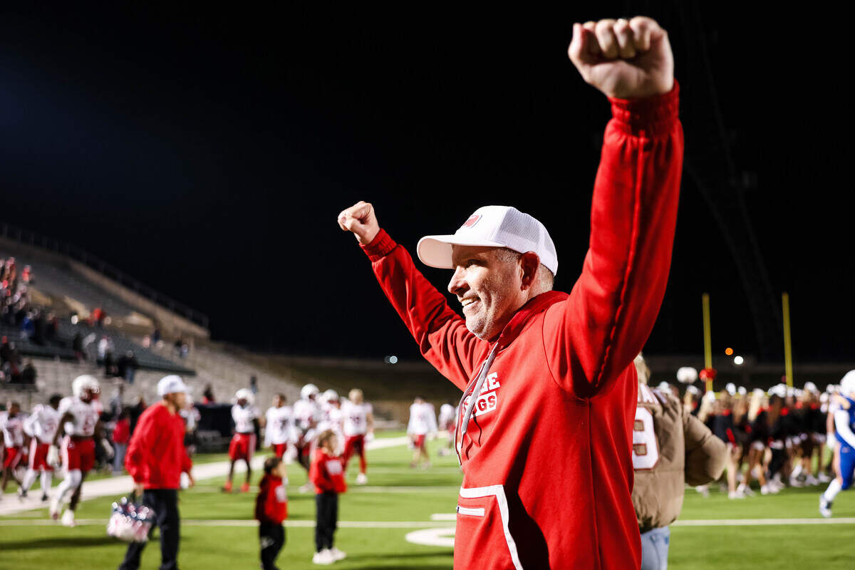 Carthage head coach Scott Surratt celebrates after a win over Brock in a Class 4A Division II state semifinal Friday at Memorial Stadium in Mesquite.