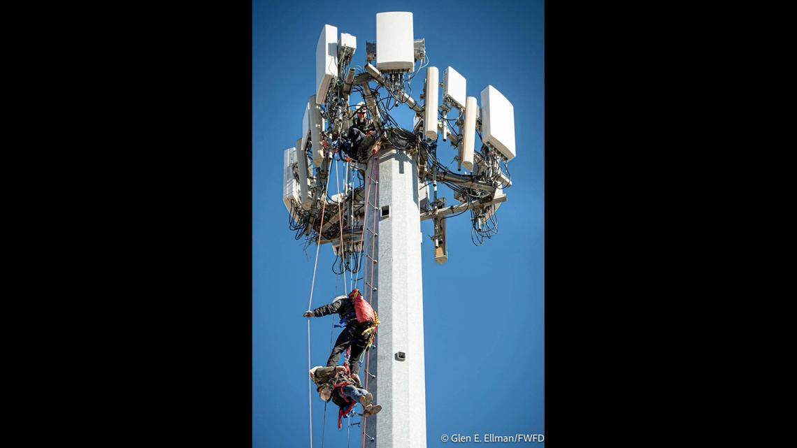 Firefighters from Burleson and Fort Worth rescued three workers from the top of a Burleson cell tower on Friday afternoon, officials say. One of the workers was critically injured after coming in contact with a high-voltage line.
