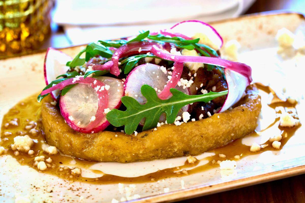 The pork-belly huarache de nixtamal with apple-mint chutney at The Seeker restaurant.