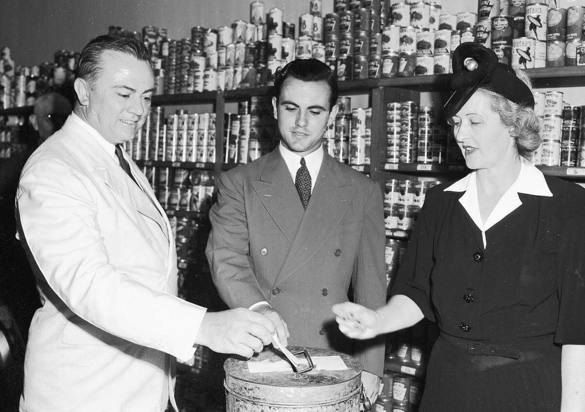 June 28, 1941: Left to right, Gov. W. Lee O’Daniel, Pat O’Daniel and Mrs. O’Daniel voting at their home box in Precinct 95 in the Senate election.