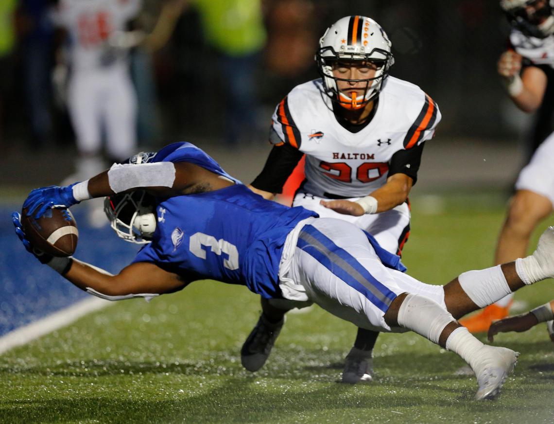 Weatherford’s Dezmond Forrest (3) stretches to try to make it to the end zone on a first half run. He was ruled down at the 1-yard line. The Haltom Buffalos played the Weatherford Kangaroos at Kangaroo Stadium in Weatherford Thursday, Oct. 3, 2019.