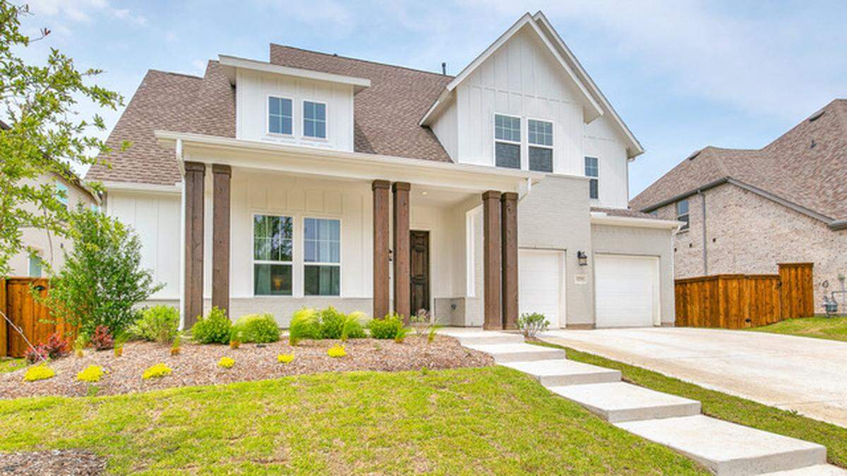 The custom home at 13725 Leatherstem Lane features designer touches, countless upgrades and an open floor plan.