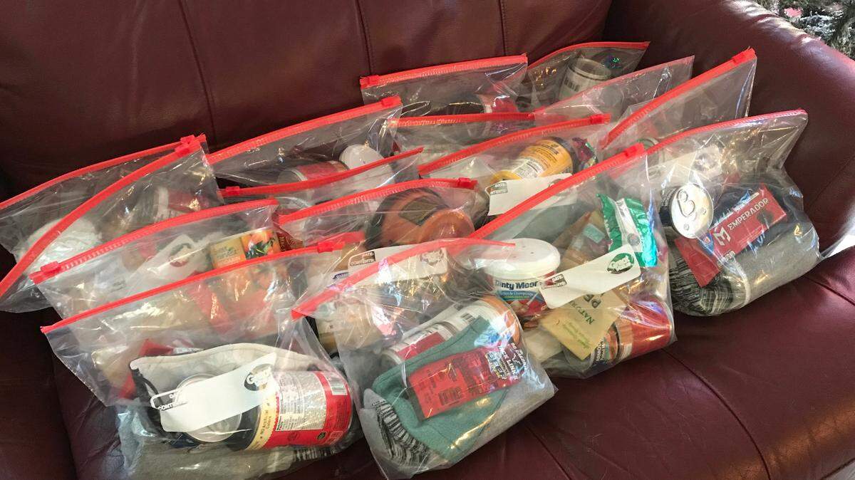 Azle youngster Tristan Gratts, 11, is working to help the homeless by creating bags of helpful goodies. Tristan and family members put the bags together and pass them out several times a month to homeless people in the Fort Worth area.