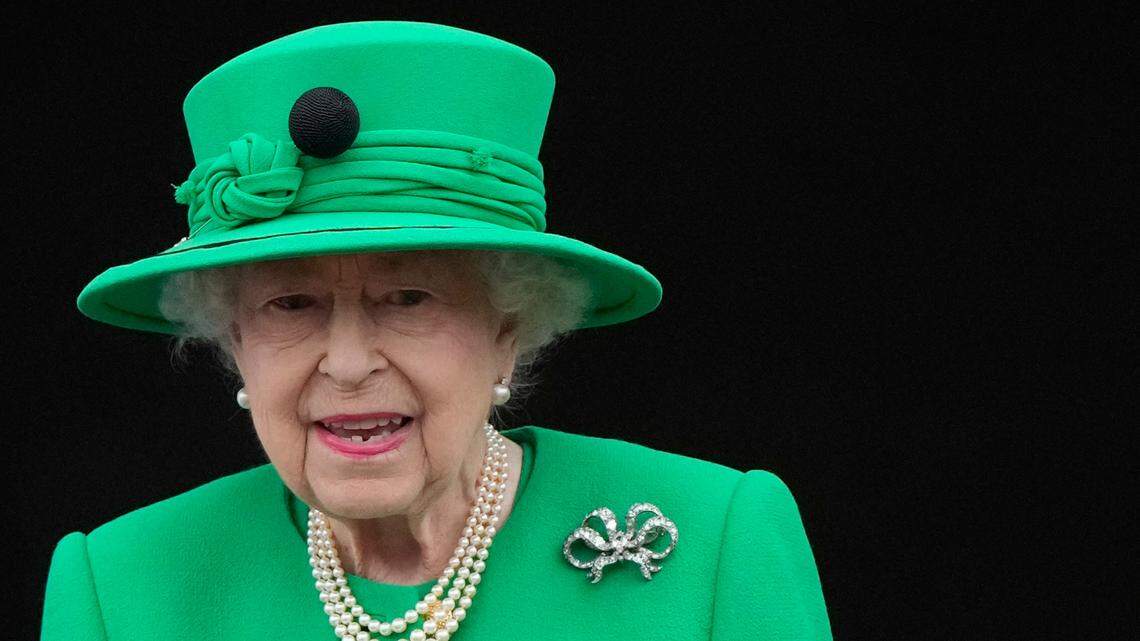 FILE - Queen Elizabeth II stands on the balcony during the Platinum Jubilee Pageant at the Buckingham Palace in London, Sunday, June 5, 2022, on the last of four days of celebrations to mark the Platinum Jubilee. Queen Elizabeth II will skip the Braemar Gathering, a popular Highland Games event, as she struggles with issues getting around. (AP Photo/Frank Augstein, Pool, File)