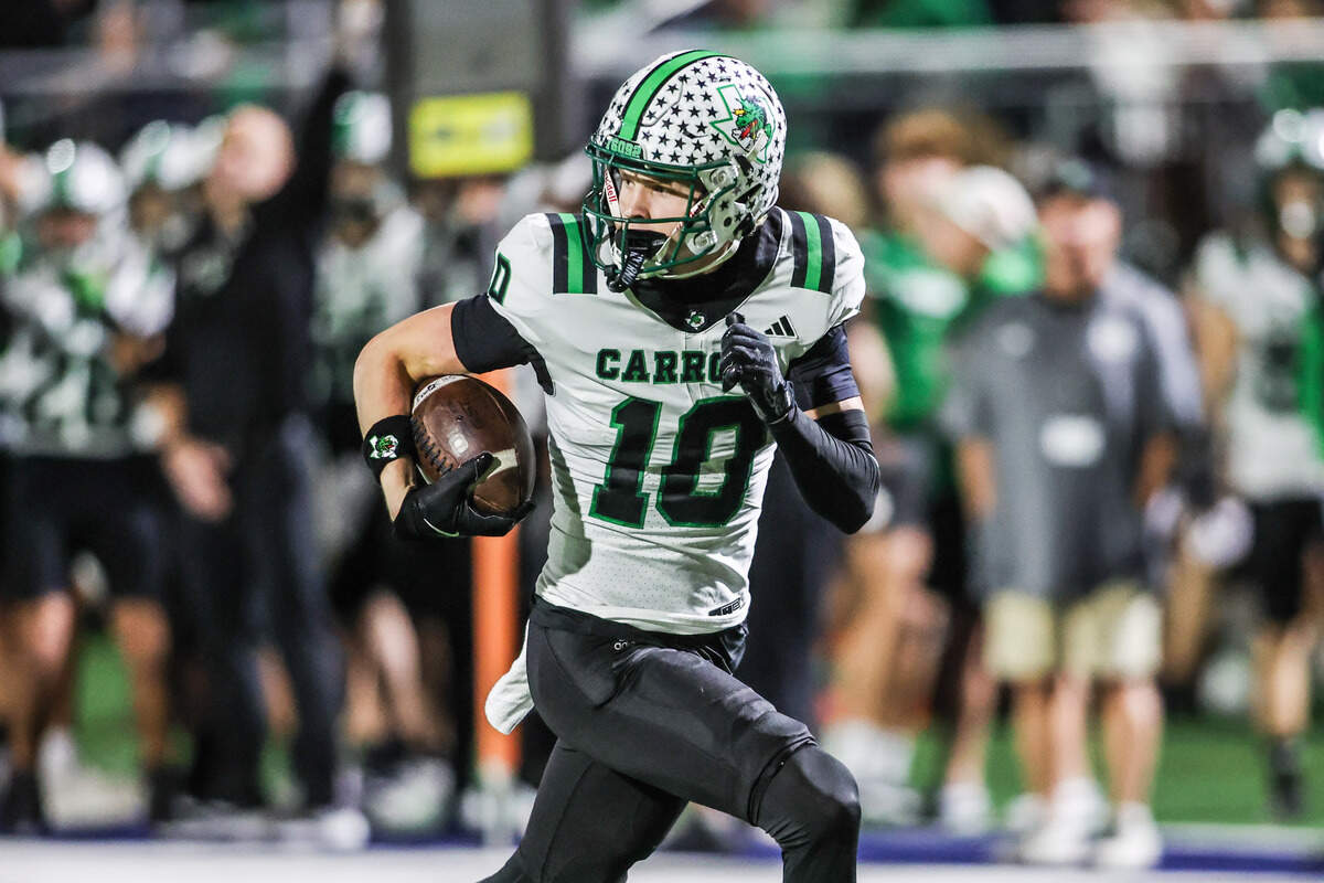 Carroll receiver Brody Knowles gets behind the defense to score in a 6A Division II area playoff game at Art Briles Stadium in Stephenville, Friday, Nov. 21, 2025.