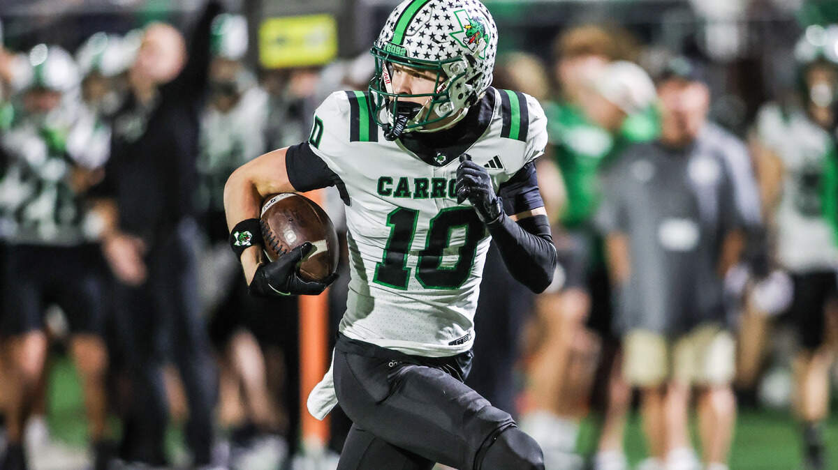 Carroll receiver Brody Knowles gets behind the defense to score in a 6A Division II area playoff game at Art Briles Stadium in Stephenville, Friday, Nov. 21, 2025.