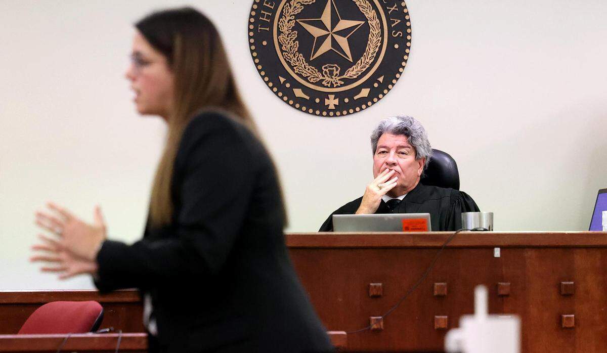 396th District Judge George Gallagher listens as Assistant Criminal District Attorney Katie Owens gives her closing arguments in the trial of defendant Braylin Brown on Nov. 9.