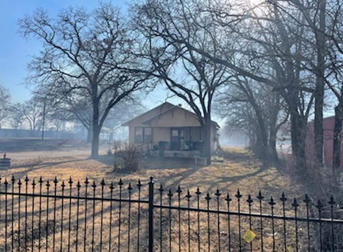 Emergency crews were on the scene of a large grass fire Tuesday afternoon, Feb. 15, 2022, near Kennedale in southeast Tarrant County. The fire was reported near Kennedale Parkway, and people were being evacuated from the area.