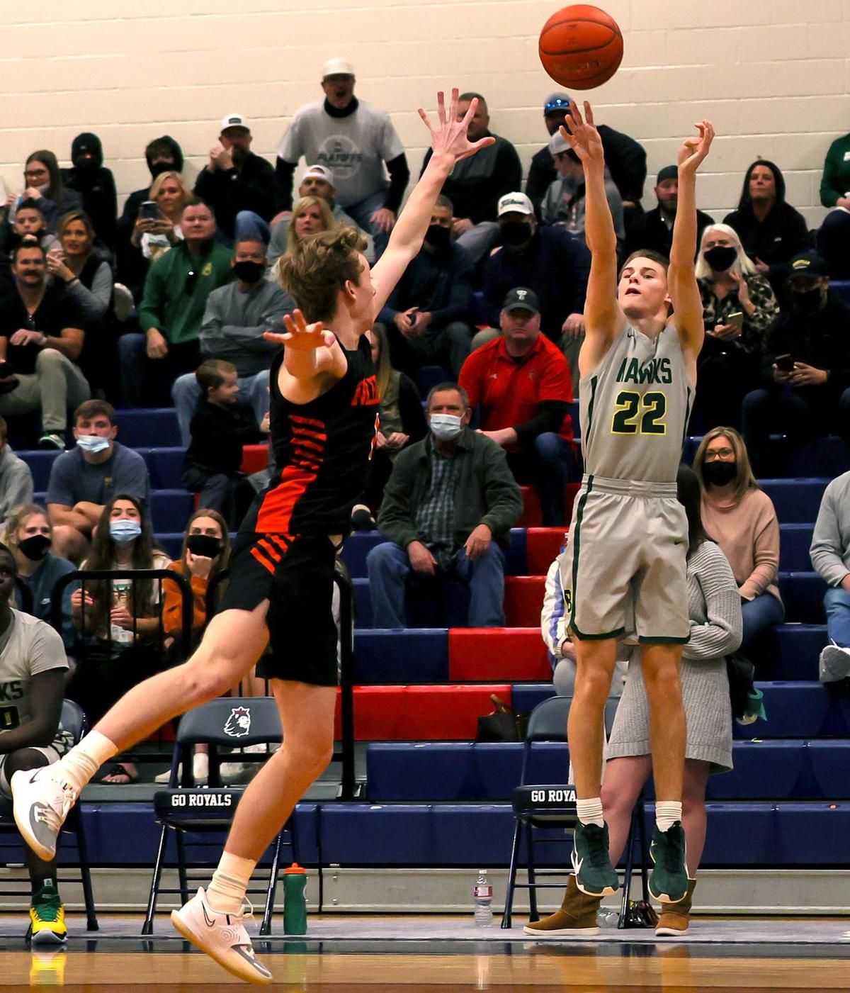 Birdville guard Chase Henderson (22) attempts a three-point shot over Aledo guard Clark Crawford (L) during the second half of a 5A Bi-district Boys High School Basketball game played at Richland High School, February 20, 2021 in North Richland Hills, Tx. (Steve Nurenberg Special to the Star-Telegram)