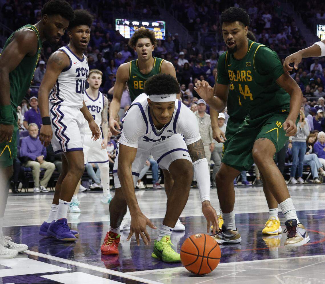 TCU forward Micah Robinson (5) grabs a loose ball under the offensive net during the second half of a NCAA basketball game between Baylor University and TCU at Schollmaier Arena in Fort Worth, Texas, Saturday Jan. 03, 2026