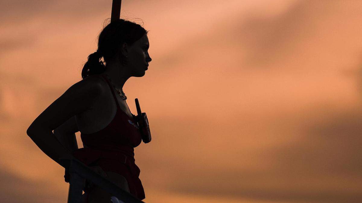 Lifeguard Kaitlyn Wood keeps watch for people swimming in the river during the Rockin’ The River Live on the Trinity Concert event at the Panther Island Pavilion in Fort Worth on Thursday, July 13, 2023.
