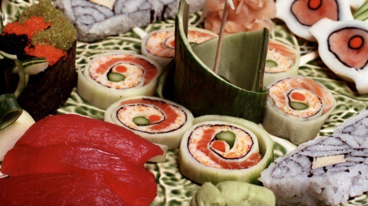 A plate of (clockwise from bottom):: Tuna sushi, assorted caviar, Tamago Roll, Ginger, Tiger’s Eye with cucumber, Tamago Roll, and Wasabi with Julie Roll, a dish named after the managing partner of the restaurant.