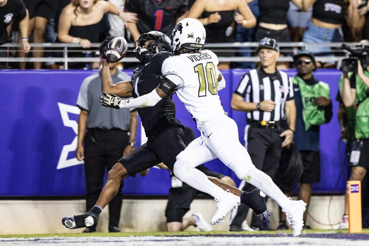 TCU wide receiver Eric McAlister (1) catches a touchdown pass over Colorado defensive back Makari Vickers (10) in the first half of an NCAA football game between TCU and Colorado at Amon G. Carter Stadium in Fort Worth on Saturday, Oct. 4, 2025.