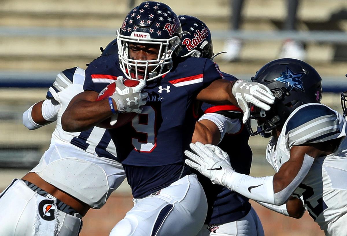 Denton Ryan running back Emani Bailey (9) fights for yardage against Frisco Lone Star during the first half of the 5A Division I State semifinal high school football playoff game played at Eagle Stadium in Allen, TX, Saturday, December 14, 2019.