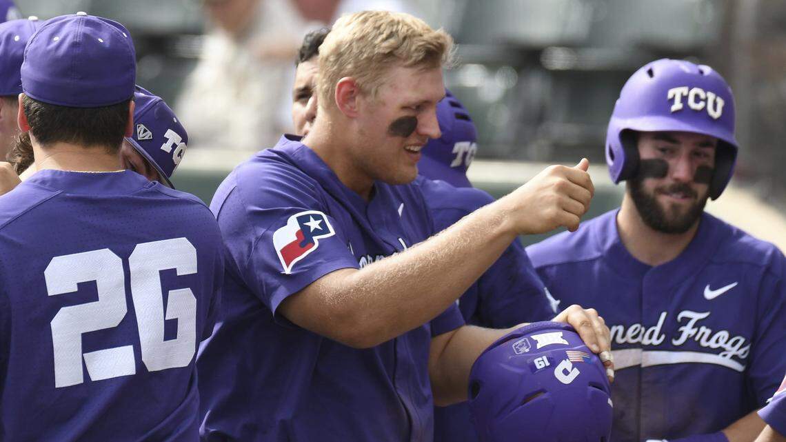 TCU's Luken Baker, middle, shown in a game earlier this season, hit two home runs - including a grand slam - and drove in a career-high six as the Frogs beat Kansas for their fourth win in a row.