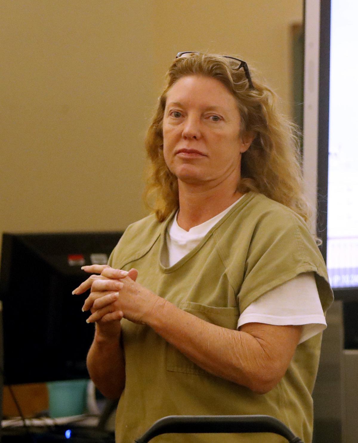 Tonya Couch enters Criminal District Court No. 2 of the Tarrant County Courthouse for a bond reduction hearing on Aug. 20, 2018.