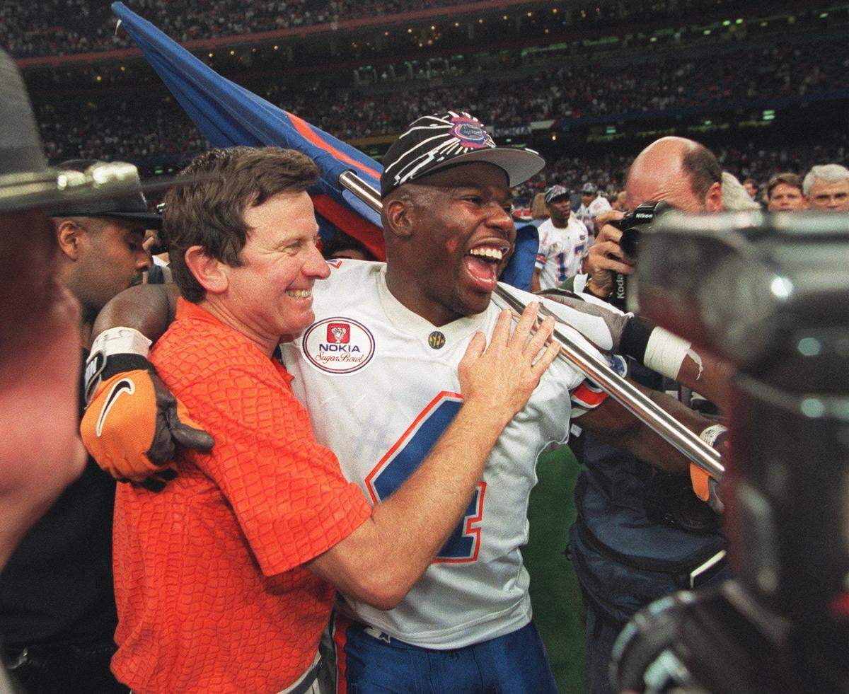 Florida Gators safety Lawrence Wright celebrates with University of Florida coach Steve Spurrier after the gators beat Florida State for the national championship in the Sugar Bowl on January 2, 1997 in New Orleans. (Allen Eyestone/Palm Beach Post)