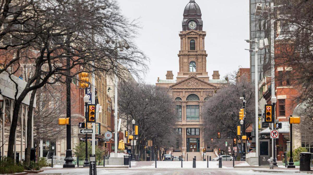 The Tarrant County Courthouse is lightly dusted with snow the morning after a light snowfall in downtown Fort Worth on Monday, Jan. 15, 2024.