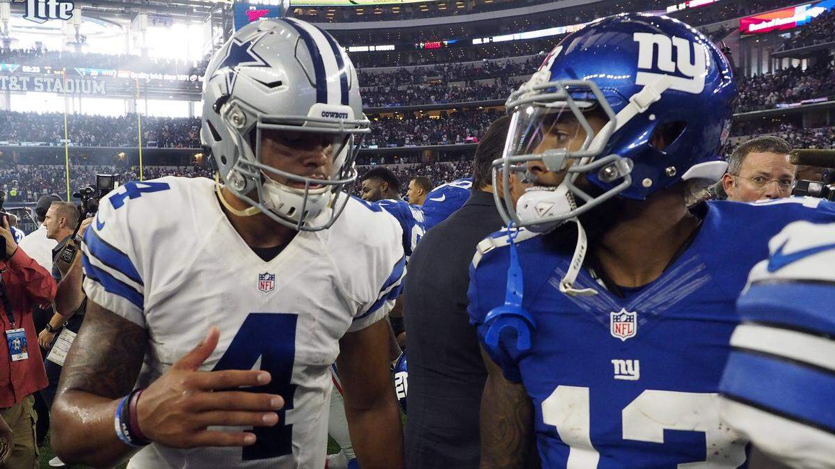 Dallas Cowboys quarterback Dak Prescott (4) greets New York Giants wide receiver Odell Beckham (13) after the game, as the Dallas Cowboys hosted the New York Giants at AT&T Stadium in Arlington, TX, on Sunday, September 11, 2016.