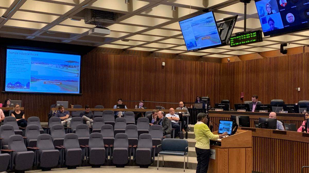 Village Creek community member Patrina Newton, at the dais, speaking in support of removing industrial land in the southeast Fort Worth community during a city zoning commission hearing Wednesday afternoon.