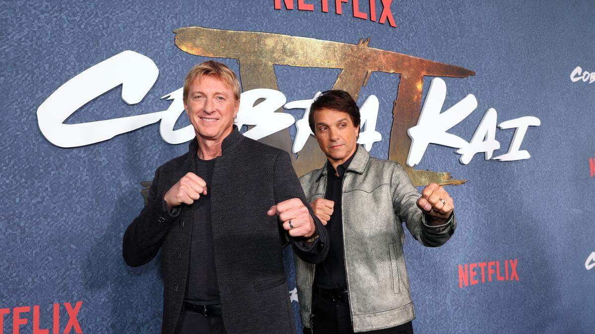 IRVING, TEXAS - NOVEMBER 13: William Zabka and Ralph Maccio attend the COBRA KAI Dallas Red Carpet Fan Screening at Alamo Drafthouse Cinema Las Colinas on November 13, 2024 in Irving, Texas.
