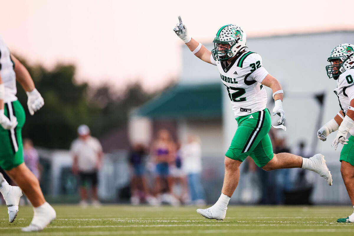 Southlake Carroll linebacker William Leins (32) points a finger in the air after a turnover in a district matchup against Keller Timber Creek on Thursday, September 25, 2025 at Keller ISD Stadium in Keller, Texas.