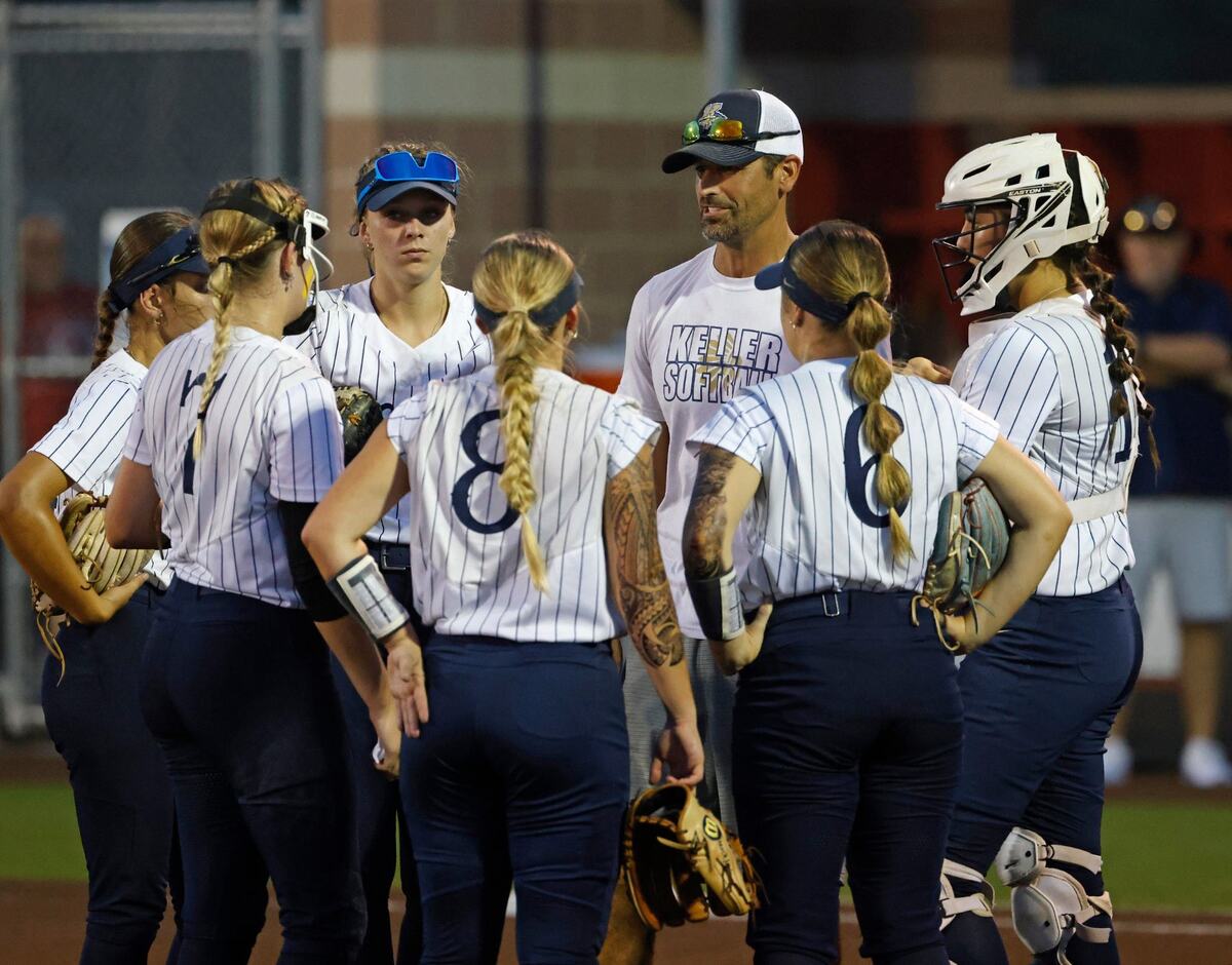 Keller head coach Chad Cribbs talks to the team as they came off the field in the sixth during the Conference 6A Region 1 Regional Finals at Coppell Softball Field in Coppell, Texas, Saturday May 25, 2024.