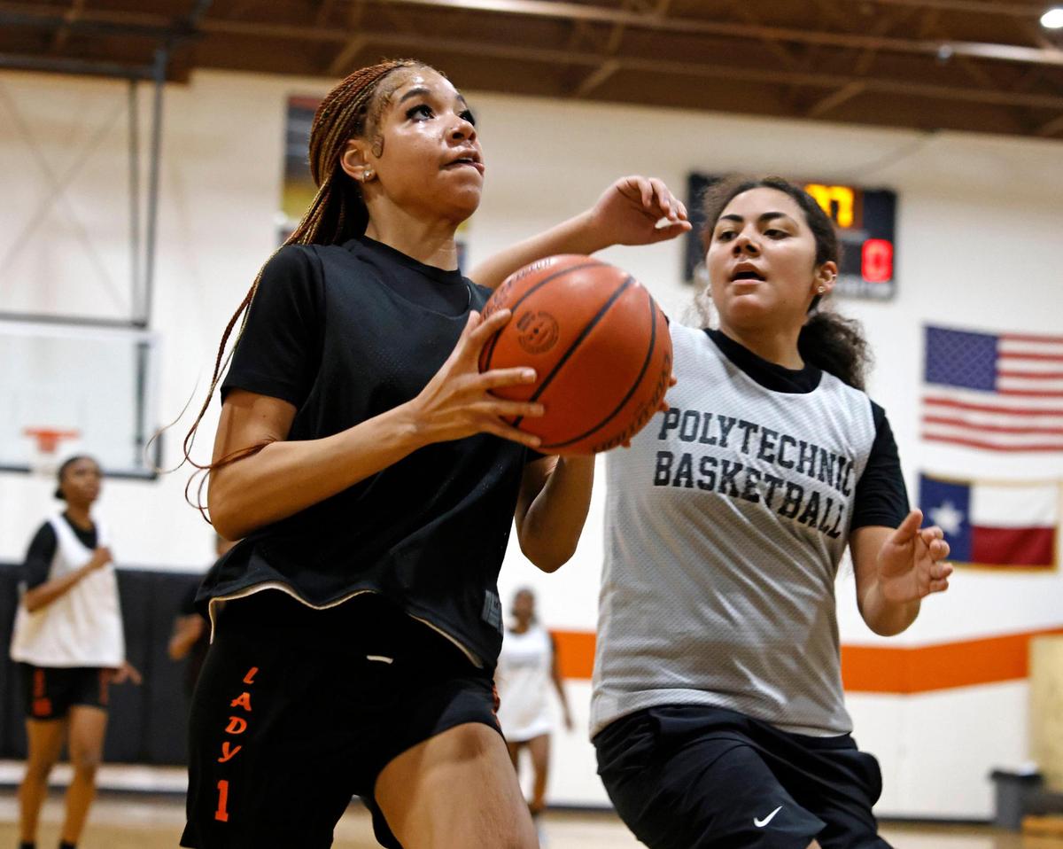 Cecilia Aguilar guards Kassidy Young during practice at Polytechnic High School outside gym in Fort Worth, Texas, Thursday, Feb. 06, 2025.
