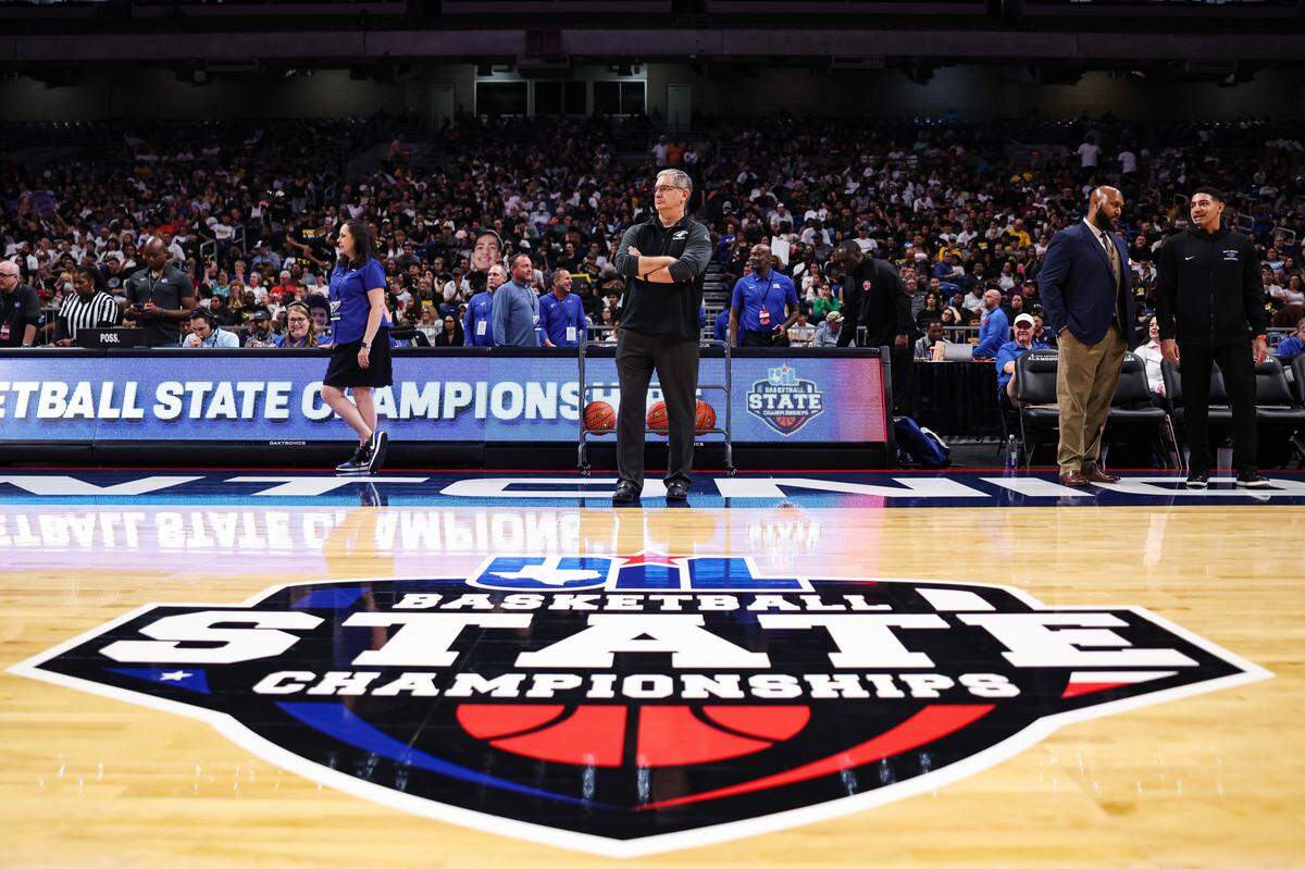 North Crowley head coach Tommy Brakel stands on the sideline in front of a UIL state championship sticker before the Class 6A Division I state championship against San Antonio Brennan at The Alamodome in San Antonio, Texas, March 14, 2026.
