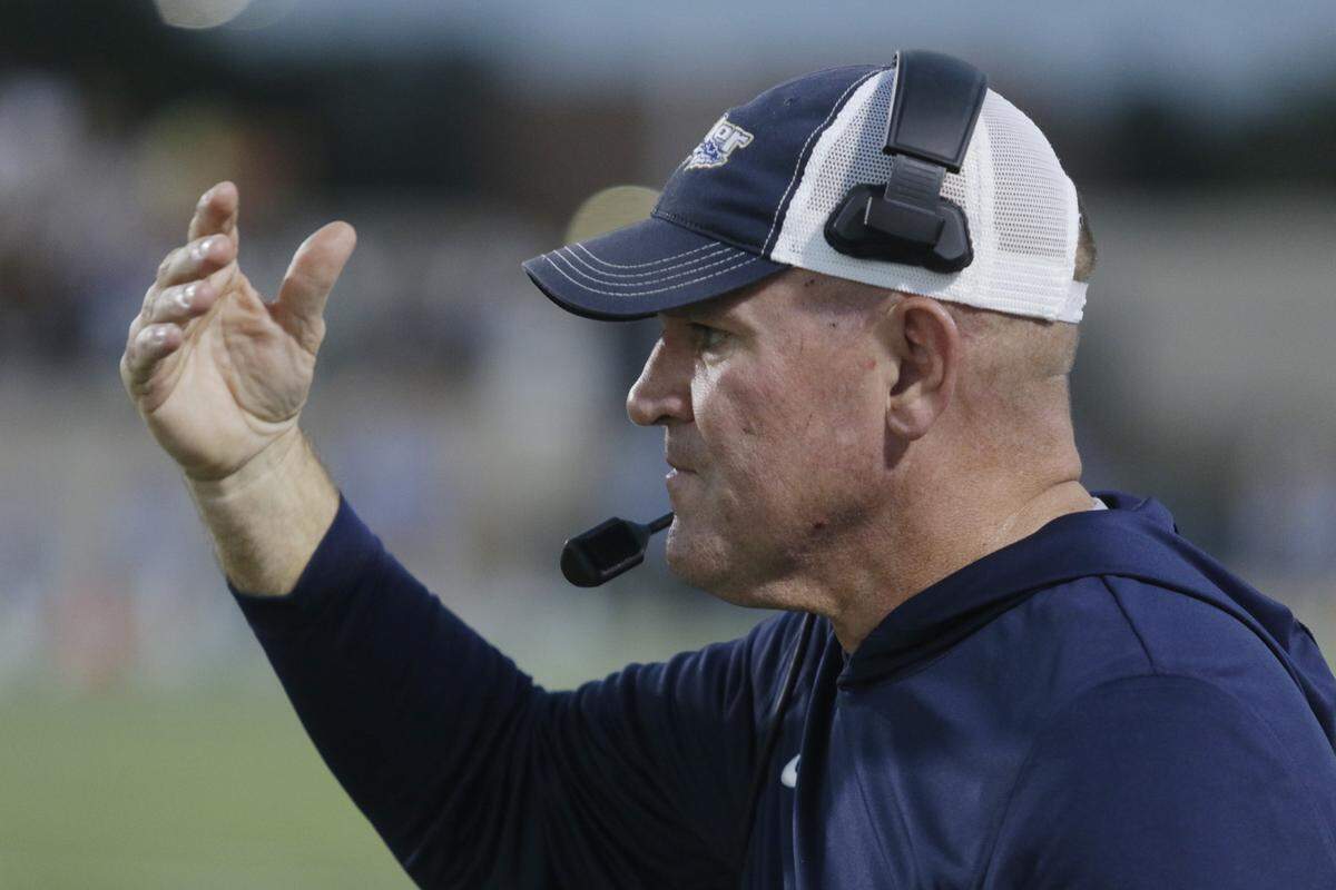 Keller head coach Carl Stralow signals to his team during its game at Pennington Field on Friday, Sept. 19, 2025 