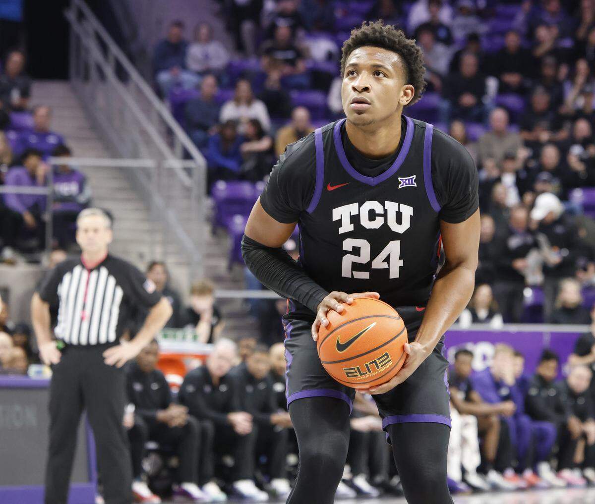 TCU forward Xavier Edmonds (24) puts their first points on the board against Houston during the first half of a NCAA basketball game between the University of Houston and TCU at Schollmaier Arena in Fort Worth, Texas, Wednesday Jan. 26, 2026