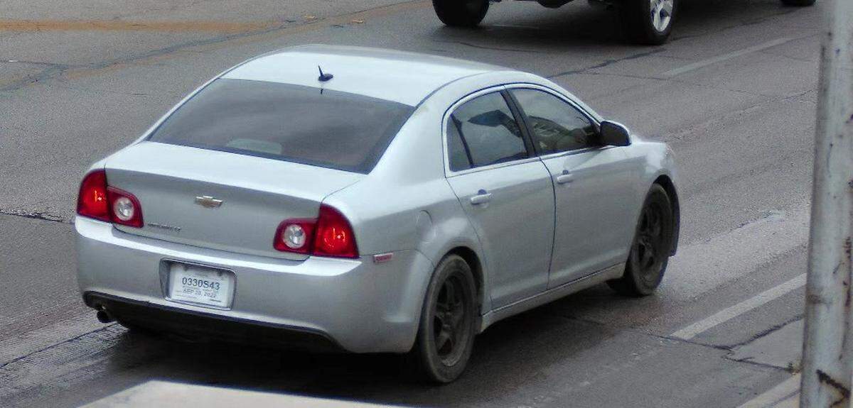 Grand Prairie police are looking for a car that an officer was chasing when he crashed his patrol vehicle and died. The car is described as a 2012-2016 Chevy Malibu, which is silver with black generic steel rims. It has paint/cosmetic damage to the upper rear passenger side post, next to the rear windshield; a rectangular object or reflector that is raised on the right rear passenger side, near the bumper seam; tinted windows, and likely has a temporary fictitious license plate.