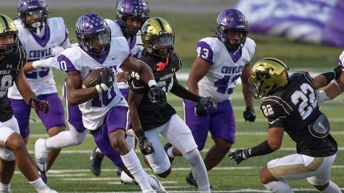 Crowley’s Zambian Burton takes the opening kickoff to a big gain setting up a Crowley touchdown on the next play during a UIL football game at Newsome Stadium on Saturday , October 10, 2024.